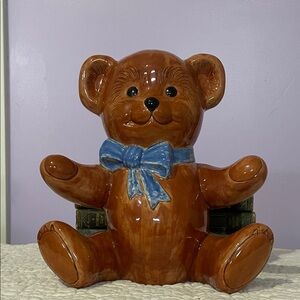 Charming Brown Teddy Bear Figurine with Blue Bow